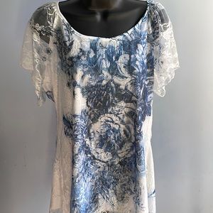 Lacy blouse with an underlay.